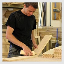 Swiss Valley Furniture Swiss Valley Furniture employee working with wood